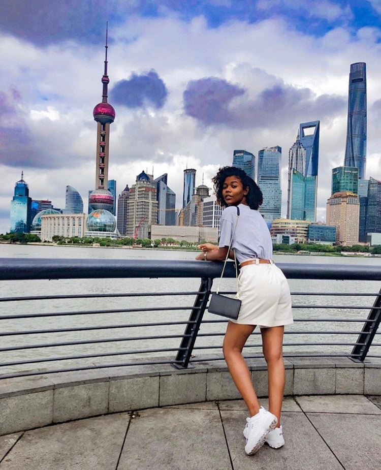 Student and Shanghai skyline