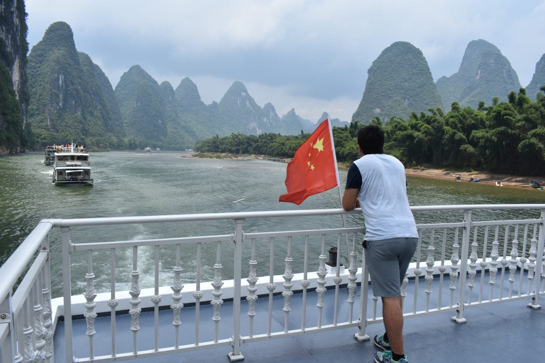 Student on Li River in China