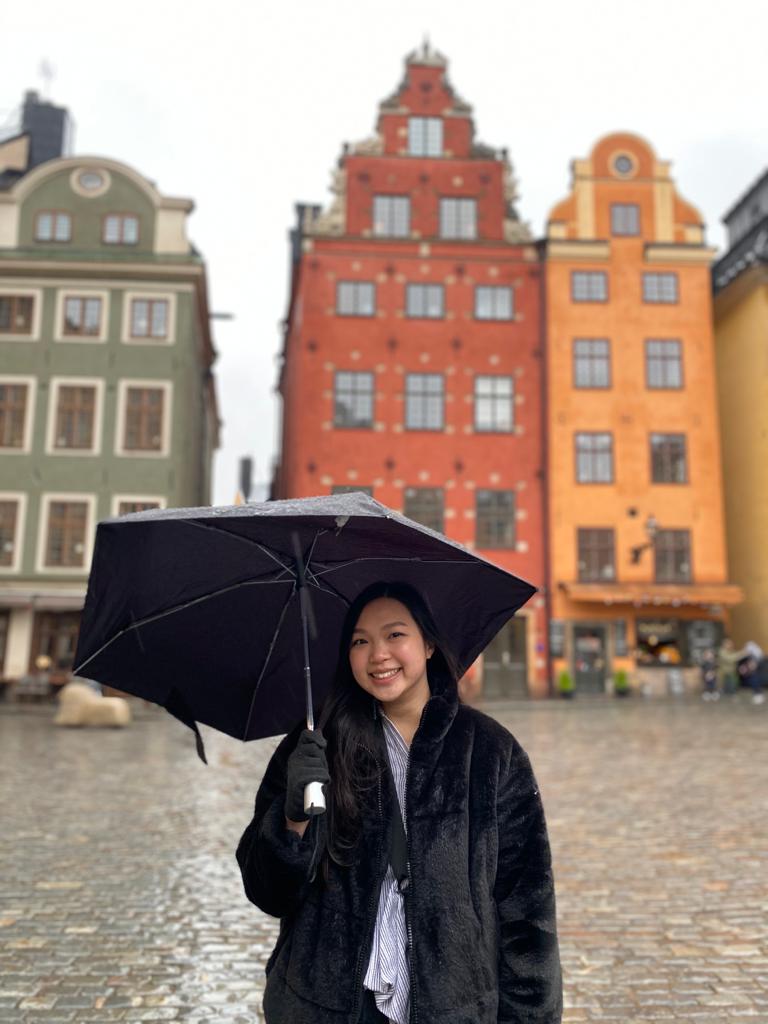 Student in the rain in Italy